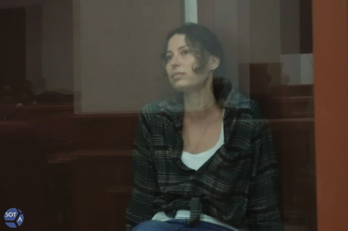 Ksenia Karelina, 33, pictured at the beginning of her trial (SOTAvision / Telegram)