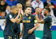 Football Soccer - Olympique Lyon v Monaco - French Ligue 1 - Stade de Lyon – Decines, France - 23/4/2017 Monaco's Radamel Falcao (C) and Kylian Mbappe (L) react after scoring. REUTERS/Robert Pratta