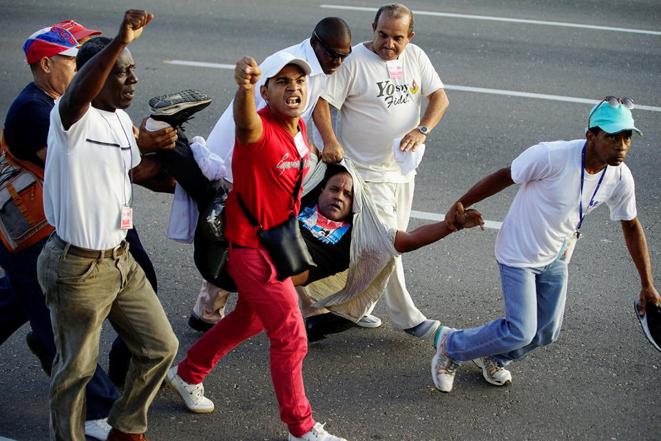 Security officers detaining man