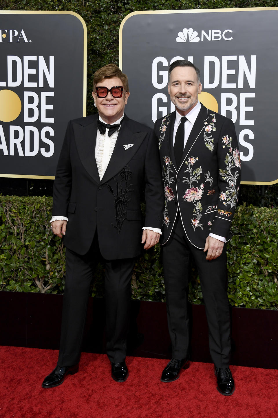 BEVERLY HILLS, CALIFORNIA - JANUARY 05: 77th ANNUAL GOLDEN GLOBE AWARDS -- Pictured: (l-r) Elton John and David Furnish arrive to the 77th Annual Golden Globe Awards held at the Beverly Hilton Hotel on January 5, 2020. -- (Photo by: Kevork Djansezian/NBC/NBCU Photo Bank via Getty Images)