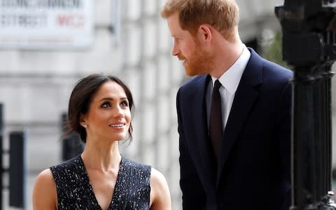 Britain's Prince Harry and his fiancee Meghan Markle arrive at a service at St Martin-in-The Fields to mark 25 years since Stephen Lawrence was killed in a racially motivated attack, in London - Credit: Reuters