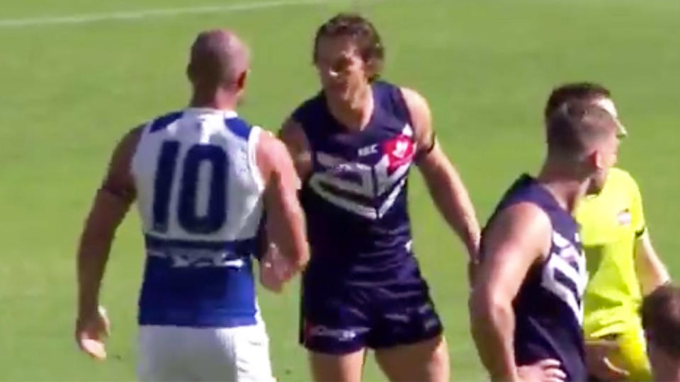 Nat Fyfe of Fremantle shakes hands with Ben Cunnington of North Melbourne. Pic: AFL