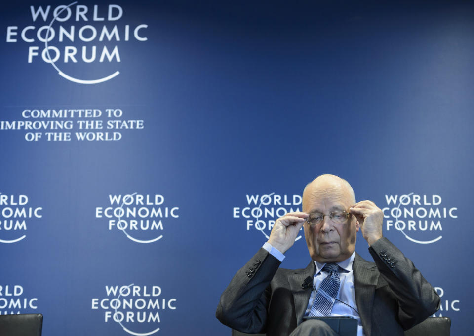 German Klaus Schwab, founder and president of the World Economic Forum, WEF, adjusts his glasses during a press conference, in Cologny near Geneva, Switzerland, Wednesday, Jan. 15, 2014. The World Economic Forum unveiled the program for its annual meeting in Davos, Switzerland, including the key participants, themes and goals. Conflicts like the war in Syria and getting the world economy back on track will be the focus of next week’s gathering of world leaders and power brokers in the Swiss ski resort of Davos. (AP Photo/Keystone, Laurent Gillieron)