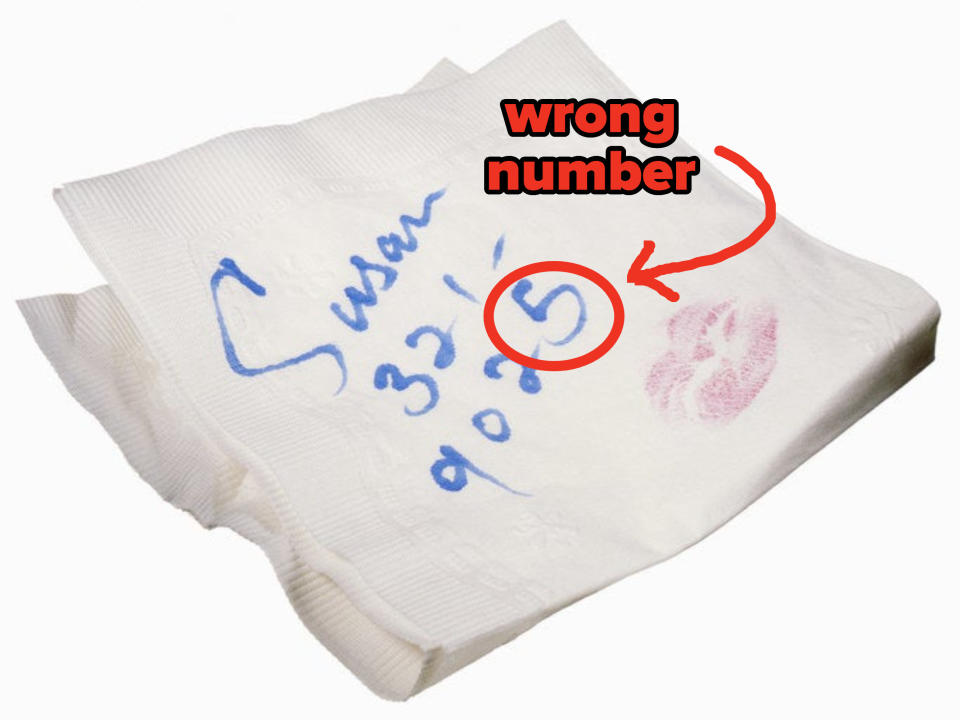 phone number for susan written on paper with a lipstick kiss with the last number labeled "wrong number"