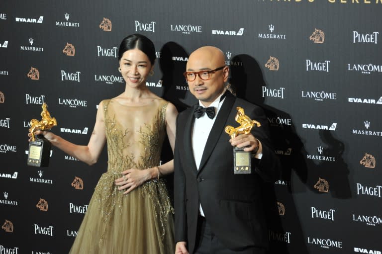 Taiwan's theatre veteran Hsieh Ying-xuan (L) beat better-known Chinese rivals to claim best actress with her first movie 'Dear EX'