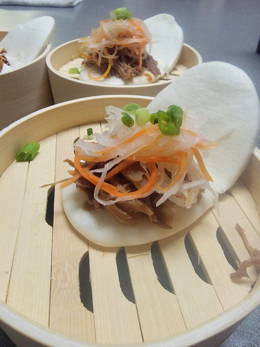 Cape May's Foo Bao restaurant, opening June of 2023, specializes in gua bao, a Taiwanese sandwich made with pliable buns wrapped around meats and veggies. Pictured here is a sweet and sour duck bao.