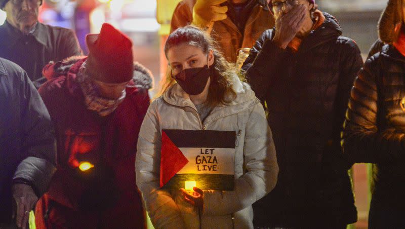 People gather in Pliny Park in Brattleboro, Vermont, for a vigil, Monday, Nov. 27, 2023, for the three Palestinian-American students who were shot while walking near the University of Vermont campus on Saturday, Nov. 25. The three students were being treated at the University of Vermont Medical Center, and one faces a long recovery because of a spinal injury, a family member said.