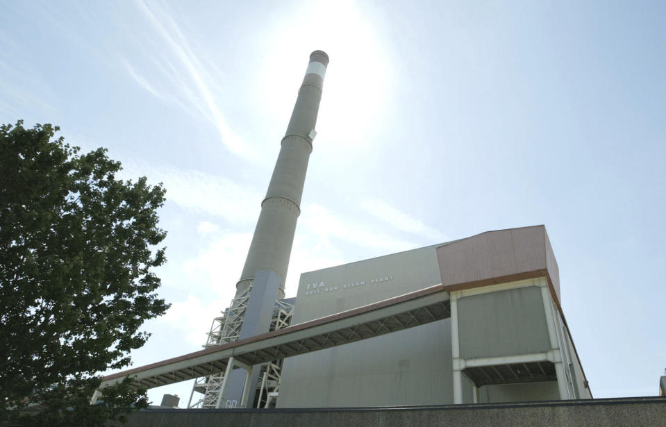 FILE - The Tennessee Valley Authority's Bull Run Fossil Plant is shown in this photo taken Wednesday, June 15, 2005, in Clinton, Tenn. A coalition of environmental groups sued the Environmental Protection Agency on Thursday, Aug. 25, 2022, over its refusal to regulate some older coal ash dumps, claiming they are polluting air and groundwater. (AP Photo/Wade Payne, File)