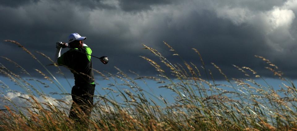 July 16, 2010 -- Tiger Woods watches his drive from the 6th tee during his second round at the British Open at St Andrews.