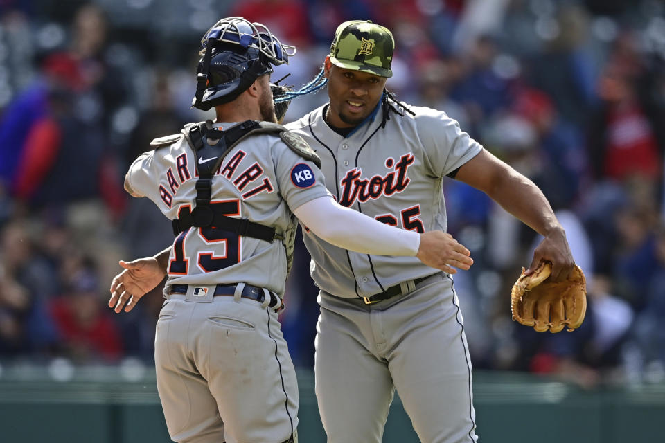 Detroit Tigers relief pitcher Gregory Soto, right, is congratulated by catcher Tucker Barnhart after they defeated the Cleveland Guardians in a baseball game, Sunday, May 22, 2022, in Cleveland. (AP Photo/David Dermer)