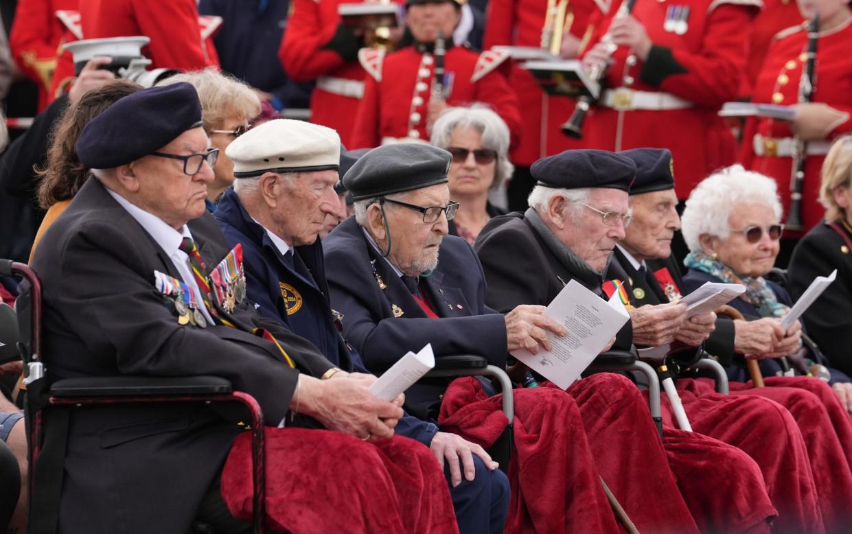D-Day veterans Ken Hay, 98 (left) and Alec Penstone, 98 (second left) at the statue of Field Marshal Montgomery during the Spirit of Normandy Trust service in Coleville-Montgomery, France