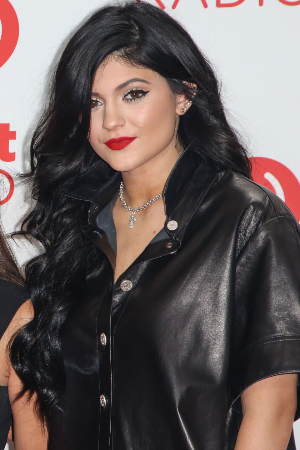 <p>Darker black hair and a matte red lipstick in 2013.</p>