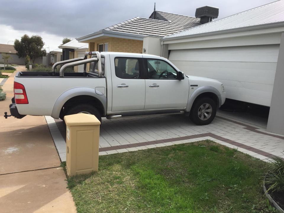 Courtney has to park her car in the driveway because the garage is not big enough to fit two cars. Source: Supplied