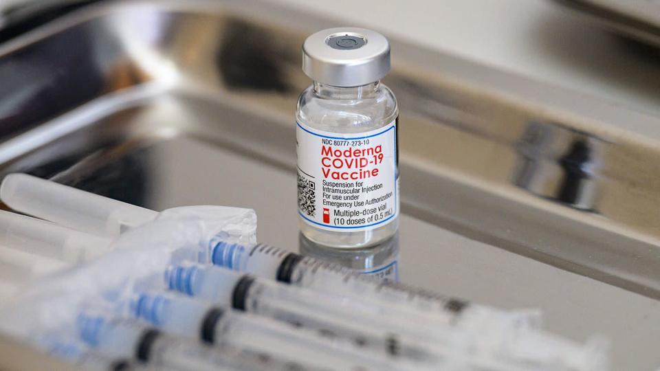 A vial of the Moderna Covid-19 vaccine and syringes sit prepared at a pop up vaccine clinic at the Jewish Community Center on April 16, 2021 in the Staten Island borough of New York City.