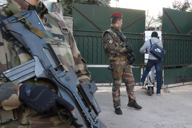 French soldiers stand guard outside the 'La Source' Jewish school in Marseille, southern France, on January 12, 2016