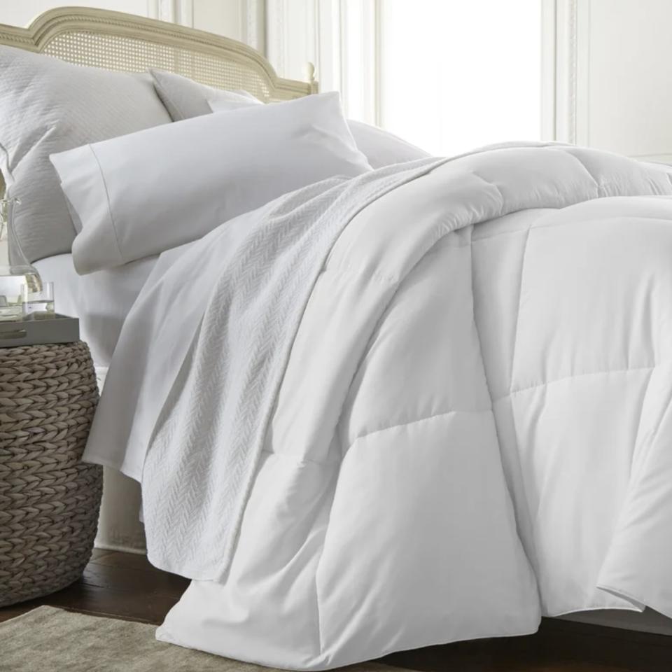 You won't be too hot or too cold with this soft piece of bedding that's perfect for the warmer months.<br /><br /><strong>Promising review:</strong> "Very comfortable! It's not too warm and not too cold at night &mdash; it&rsquo;s just right! The king-size fits perfectly for a queen bed for two blanket hogs." &mdash; <a href="https://go.skimresources.com?id=38395X987171&amp;xs=1&amp;xcust=-HPWayDaySale4-28-21-60896f93e4b09cce6c197126&amp;url=https%3A%2F%2Fwww.wayfair.com%2Fbed-bath%2Fpdp%2Falwyn-home-all-season-down-alternative-comforter-anew1412.html" target="_blank" rel="noopener noreferrer">Matthew</a><br /><br /><strong>Price:</strong> <a href="https://go.skimresources.com?id=38395X987171&amp;xs=1&amp;xcust=-HPWayDaySale4-28-21-60896f93e4b09cce6c197126&amp;url=https%3A%2F%2Fwww.wayfair.com%2Fbed-bath%2Fpdp%2Falwyn-home-all-season-down-alternative-comforter-anew1412.html" target="_blank" rel="nofollow noopener noreferrer" data-skimlinks-tracking="5938996" data-vars-affiliate="CJ" data-vars-campaign="31WaydaySale-Hernandez-04-28-21-5938996/https://www.wayfair.com/bed-bath/pdp/alwyn-home-all-season-down-alternative-comforter-anew1412.html" data-vars-href="https://www.anrdoezrs.net/links/8209452/type/dlg/sid/31WaydaySale-Hernandez-04-28-21-5938996/https://www.wayfair.com/bed-bath/pdp/alwyn-home-all-season-down-alternative-comforter-anew1412.html" data-vars-keywords="fast fashion" data-vars-link-id="16676882" data-vars-price="" data-vars-product-id="21102553" data-vars-product-img="https://secure.img1-fg.wfcdn.com/im/41095946/resize-h800-w800%5Ecompr-r85/1083/108309730/All+Season+Microfiber+Down+Alternative+Comforter.jpg" data-vars-product-title="All Season Microfiber Down Alternative Comforter" data-vars-redirecturl="https://www.wayfair.com/bed-bath/pdp/alwyn-home-all-season-down-alternative-comforter-anew1412.html" data-vars-retailers="wayfair" data-ml-dynamic="true" data-ml-dynamic-type="sl" data-orig-url="https://www.anrdoezrs.net/links/8209452/type/dlg/sid/31WaydaySale-Hernandez-04-28-21-5938996/https://www.wayfair.com/bed-bath/pdp/alwyn-home-all-season-down-alternative-comforter-anew1412.html" data-ml-id="36">$23.99</a> (originally $119.99; available in three sizes and six colors)<br /><br /><i>See more bedding options for <a href="https://go.skimresources.com?id=38395X987171&amp;xs=1&amp;xcust=-HPWayDaySale4-28-21-60896f93e4b09cce6c197126&amp;url=https%3A%2F%2Fwww.wayfair.com%2Fdaily-sales%2Fway-day%253a-bedding%7Ee220834.html" target="_blank" rel="noopener noreferrer">up to 70% off</a>.</i>