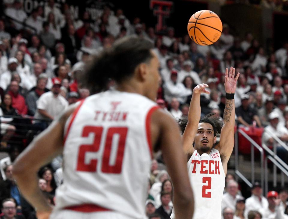 Texas Tech's guard Pop Isaacs (2) shoots the ball against Baylor in a Big 12 men's basketball game, Tuesday, Jan. 17, 2022, at United Supermarkets Arena.