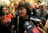 Senator Susan Collins (R-ME) is surrounded by journalists as she walks from a Republican Senate caucus meeting with U.S. Vice President Mike Pence on Capitol Hill in Washington, U.S., September 26, 2018. REUTERS/Joshua Roberts