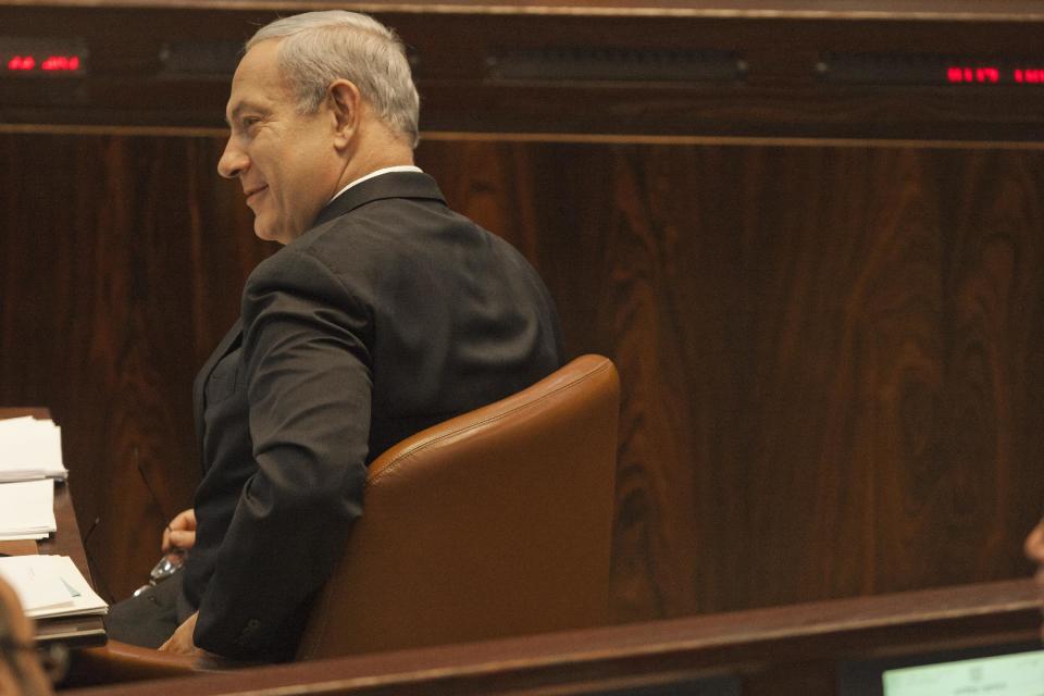 Isreal Prime Minister Benjamin Netanyahu attends a Knesset session in Jerusalem, Monday, Oct. 15, 2012. (AP Photo/Sebastian Scheiner)