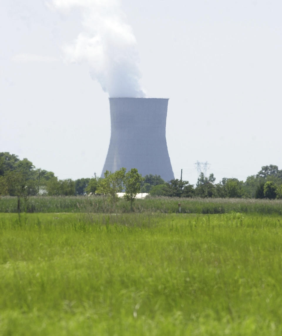 FILE - The Hope Creek Nuclear Generating Station in Lower Alloways Creek, N.J. releases steam Friday, July 12, 2002. On Wednesday, April 3, 2024, PSEG Nuclear said it will ask federal regulators to extend the licenses for the three plants for an additional 20 years. (AP Photo/ Brian Branch-Price, File)