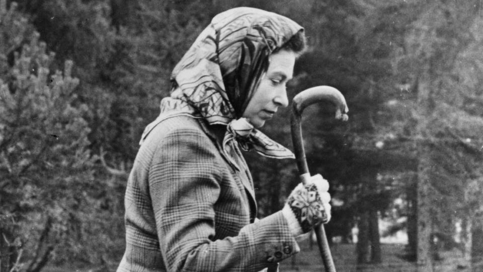 Queen Elizabeth II walking cross country