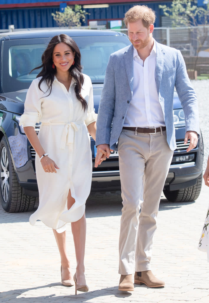 JOHANNESBURG, SOUTH AFRICA - OCTOBER 02: (UK OUT FOR 28 DAYS) Meghan, Duchess of Sussex accompanied by Prince Harry, Duke of Sussex visit the Tembisa Township to learn about Youth Employment Services during their royal tour of South Africa on October 02, 2019 in Johannesburg, South Africa.  (Photo by Pool/Samir Hussein/WireImage)