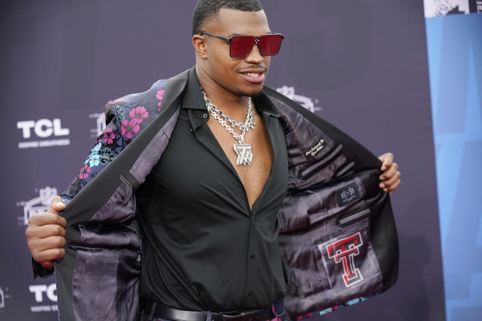 Texas Tech defensive lineman Tyree Wilson arrives on the red carpet before the first round of the NFL football draft, Thursday, April 27, 2023, in Kansas City, Mo. (AP Photo/Charlie Riedel)