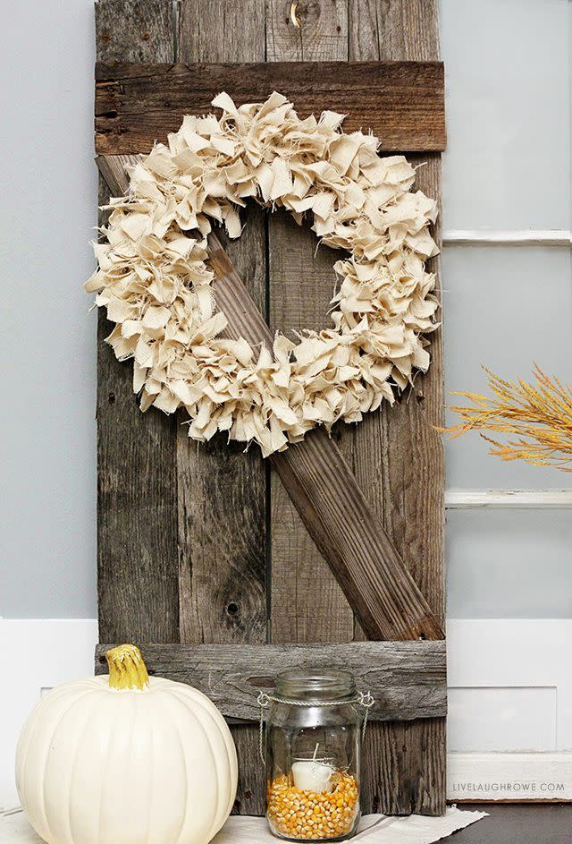 <p>Who knew a drop cloth could look so pretty?</p><p><strong>Get the tutorial at <a href="https://livelaughrowe.com/neutral-fall-wreath/" rel="nofollow noopener" target="_blank" data-ylk="slk:Live Laugh Rowe;elm:context_link;itc:0;sec:content-canvas" class="link ">Live Laugh Rowe</a>.</strong></p>