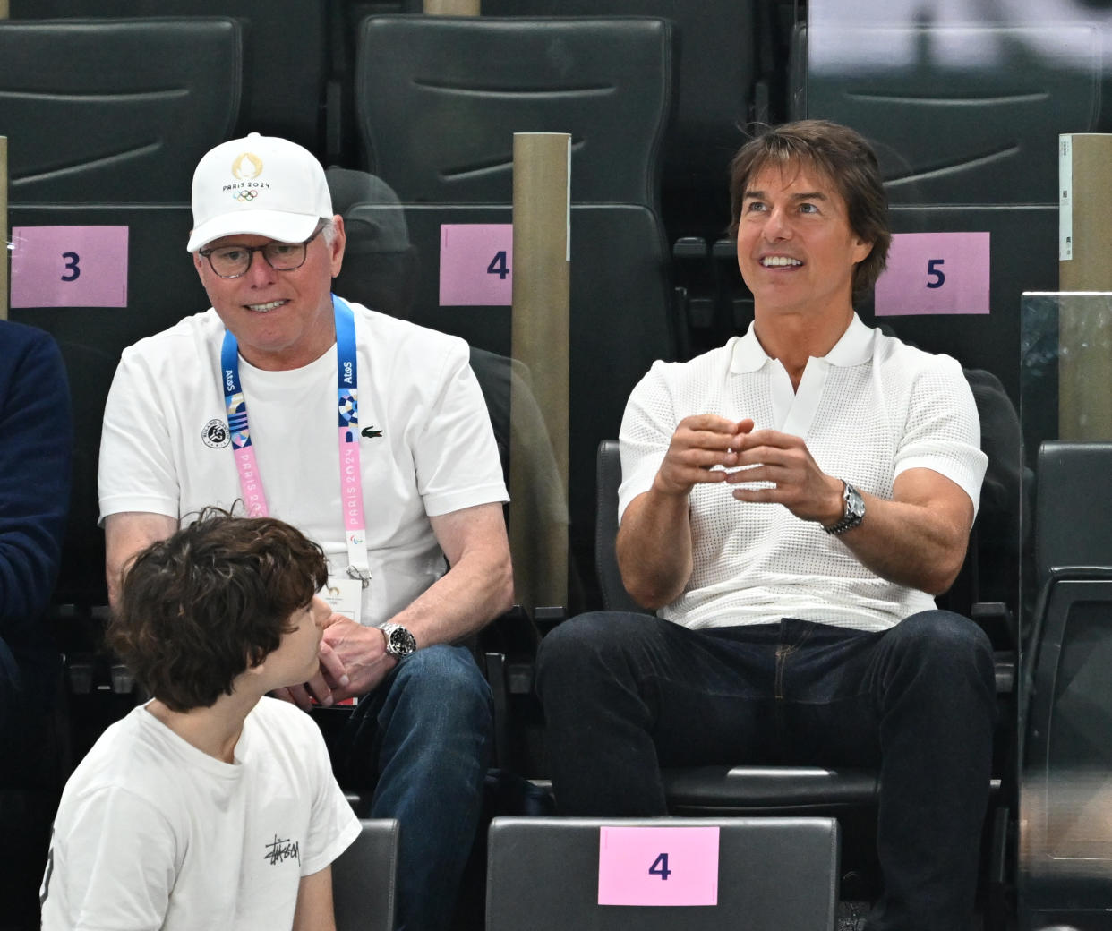 PARIS, FRANCE - JULY 28: Tom Cruise (R) looks on with CEO of Warner Bros. Discovery
David Zaslav (L) as they attend the Artistic Gymnastics Women's Qualification on day two of the Olympic Games Paris 2024 at Bercy Arena  in Paris, France on July 28, 2024. (Photo by Mustafa Yalcin/Anadolu via Getty Images)