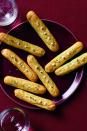 <p>These aren't your average breadsticks: they're filled with sour cream and cheese — yum. </p><p><em>Get the <a href="https://www.womansday.com/food-recipes/food-drinks/recipes/a12446/parmesan-pastry-pipes-recipe-wdy1213/" rel="nofollow noopener" target="_blank" data-ylk="slk:Parmesan Pastry Pipes recipe;elm:context_link;itc:0;sec:content-canvas" class="link ">Parmesan Pastry Pipes recipe</a>.</em></p>