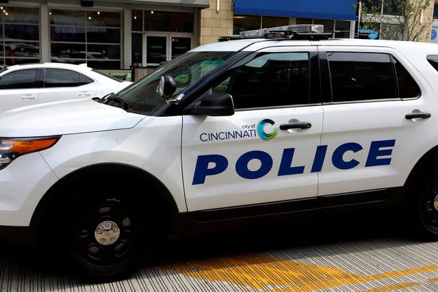 <p>Raymond Boyd/Getty</p> A Cincinnati police vehicle