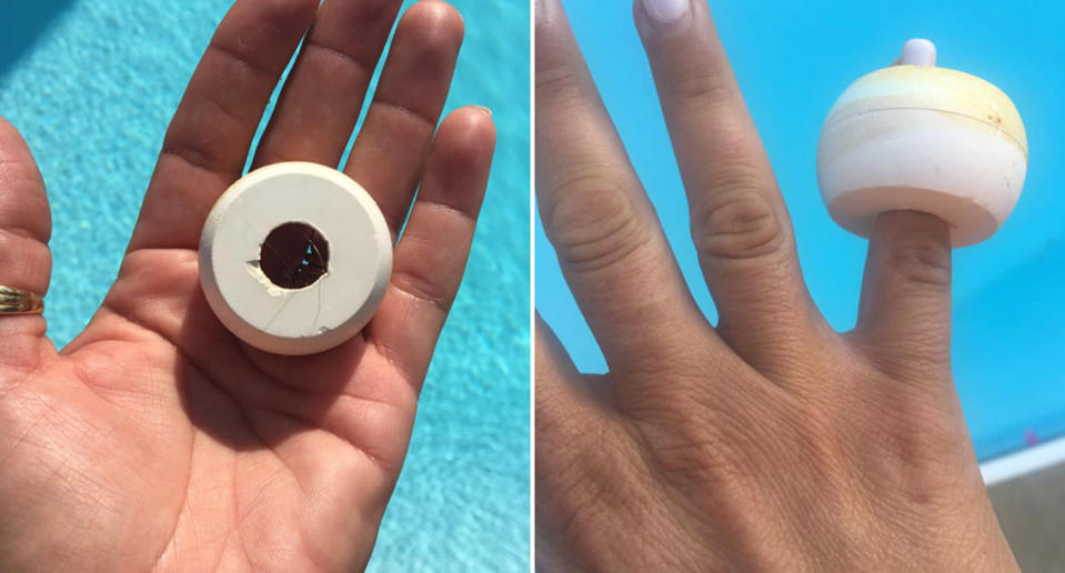 A woman holds the ring from a pool jet in her hand.