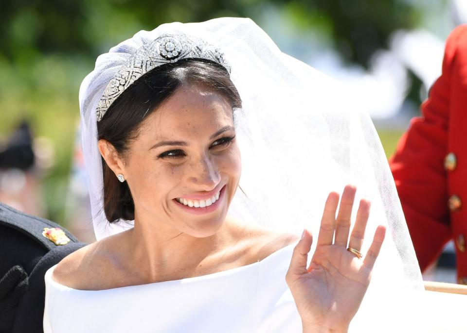 <p>There was a lot of speculation going into the royal wedding about which tiara the new Duchess of Sussex would choose for her big day. Ultimately, the actress borrowed <a href="https://www.townandcountrymag.com/style/jewelry-and-watches/a20756656/queen-mary-diamond-bandeau-tiara-meghan-markle-royal-wedding/" rel="nofollow noopener" target="_blank" data-ylk="slk:a diamond and platinum bandeau setting from the Queen's collection;elm:context_link;itc:0;sec:content-canvas" class="link ">a diamond and platinum bandeau setting from the Queen's collection</a> which also has a special connection for Her Majesty—it belonged to Queen Mary, Elizabeth II's grandmother and was officially bequeathed to the Queen upon Mary's death. </p>