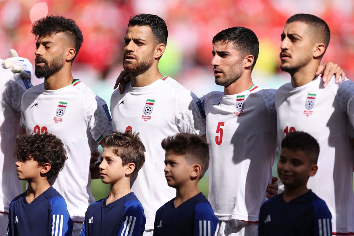 Iran’s players sing the national anthem  (Getty Images)