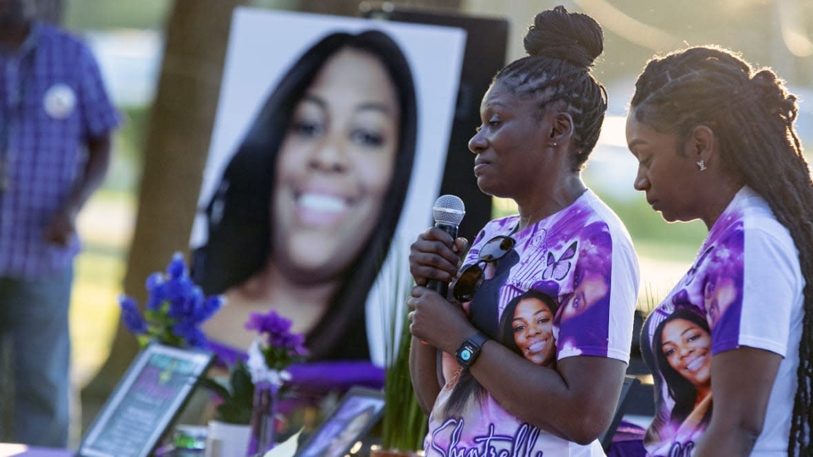 Pamela Dias (second from right) remembers her daughter, Ajike Owens, as mourners gather for a remembrance service at Immerse Church of Ocala for Owens on June 8, in Ocala, Florida. (Photo by Alan Youngblood/AP, File)