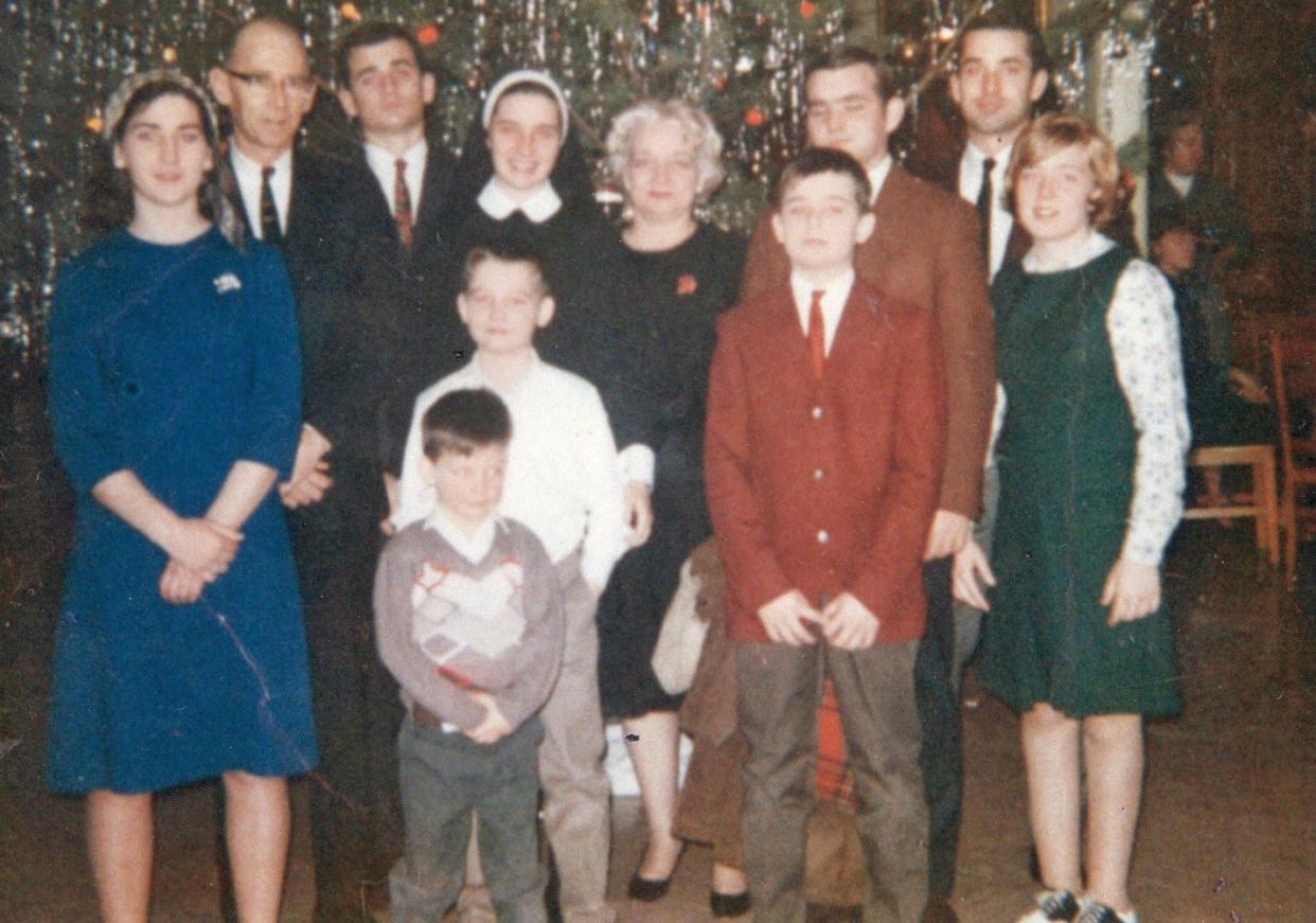 The Murray family at Christmas: Peggy, father Ed, Billy, Nancy, mother Lucille, Brian, Edward, Laura, Andy, Johnny and Joel.