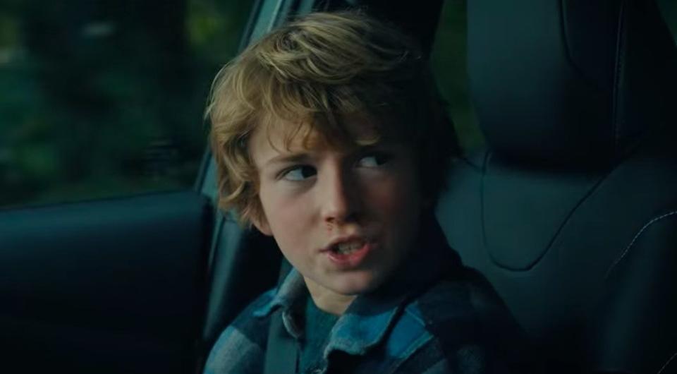 Young Adam talking in his mom's car in "The Adam Project"