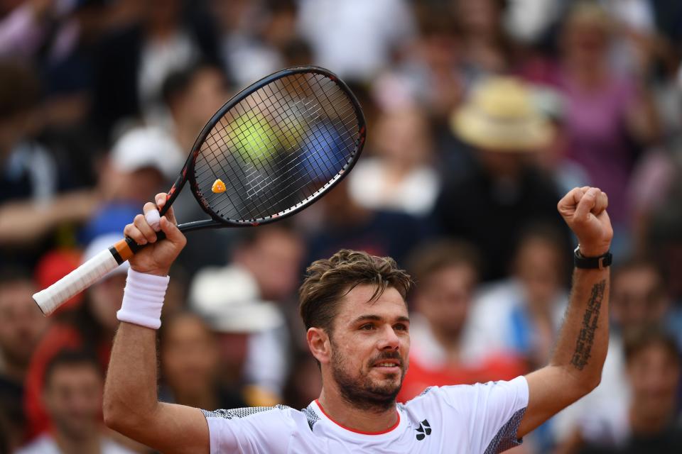 Switzerland's Stanislas Wawrinka celebrates after winning against Chile's Christian Garin during their men's singles second round match on day four of The Roland Garros 2019 French Open tennis tournament in Paris on May 29, 2019. (Photo by Anne-Christine POUJOULAT / AFP)        (Photo credit should read ANNE-CHRISTINE POUJOULAT/AFP/Getty Images)