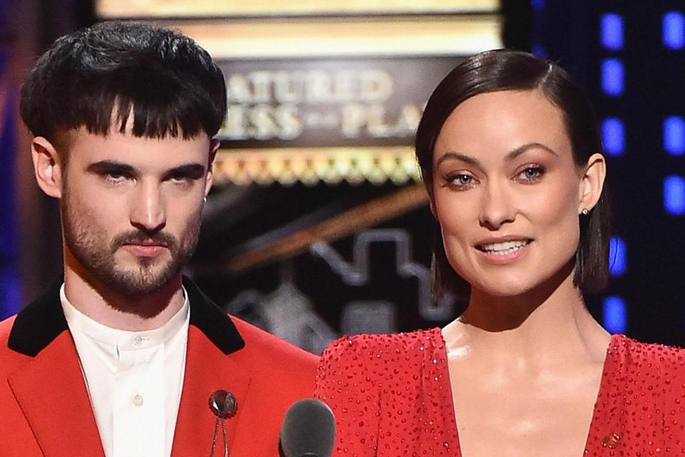 Tom Sturridge and Olivia Wilde speak onstage during the Tony Awards: Getty Images