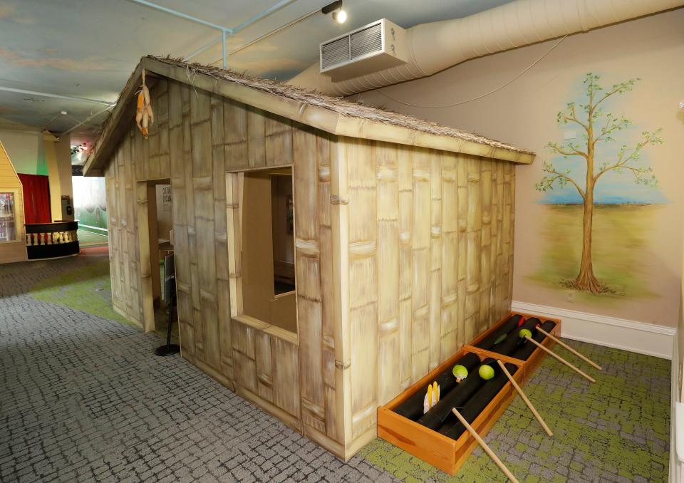 A view of a Hmong garden and hut representation for the new Cultural Exchange exhibit at the Above and Beyond Children’s Museum, Tuesday, May 16, 2023, in Sheboygan, Wis.