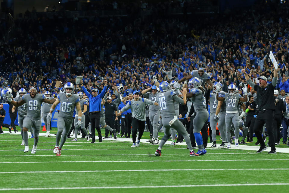 Detroit Lions players celebrate theis first season victory over the Minnesota Vikings in Detroit, Michigan USA, on Sunday, December 5, 2021. / Credit: Jorge Lemus/NurPhoto via Getty Images