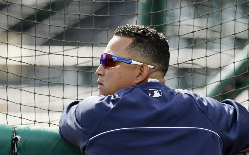 Detroit Tigers first baseman Miguel Cabrera watches batting practice before a spring exhibition baseball game against the Tampa Bay Rays in Lakeland, Fla., Friday, March 28, 2014. (AP Photo/Carlos Osorio)