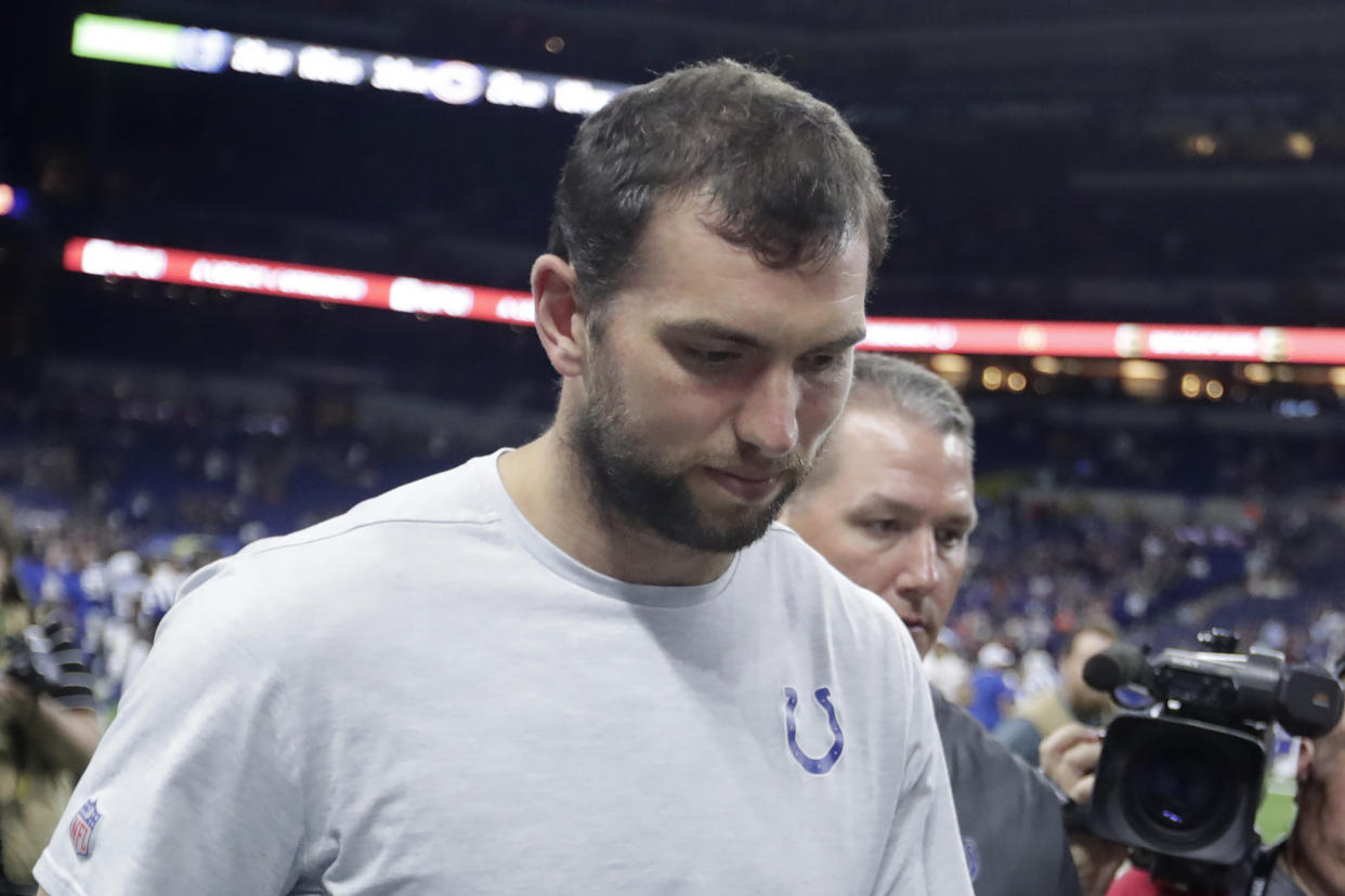 Indianapolis Colts quarterback Andrew Luck leaves the field following the team's NFL preseason football game against the Chicago Bears, Saturday, Aug. 24, 2019, in Indianapolis. Chicago won 27-17. (AP Photo/Michael Conroy)