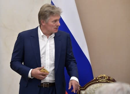 FILE PHOTO: Kremlin spokesman Peskov attends a meeting in Moscow