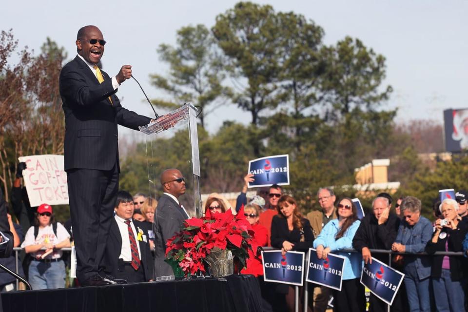 <div class="inline-image__caption"><p>On the campaign trail in 2011.</p></div> <div class="inline-image__credit">Scott Olson/Getty</div>