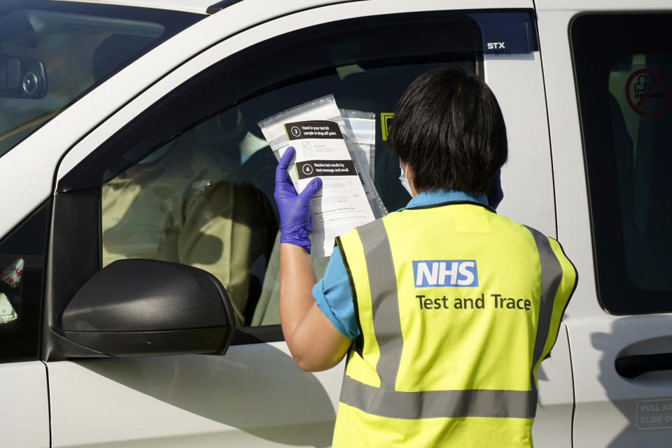 BOLTON, ENGLAND - SEPTEMBER 17: People attend a drive-in Covid-19 testing centre on September 17, 2020 in Bolton, England.  Fears about rising infection rates among younger people across the Uk has forced the government into tighter lockdown restrictions, particularly in the North of England.  (Photo by Christopher Furlong/Getty Images)