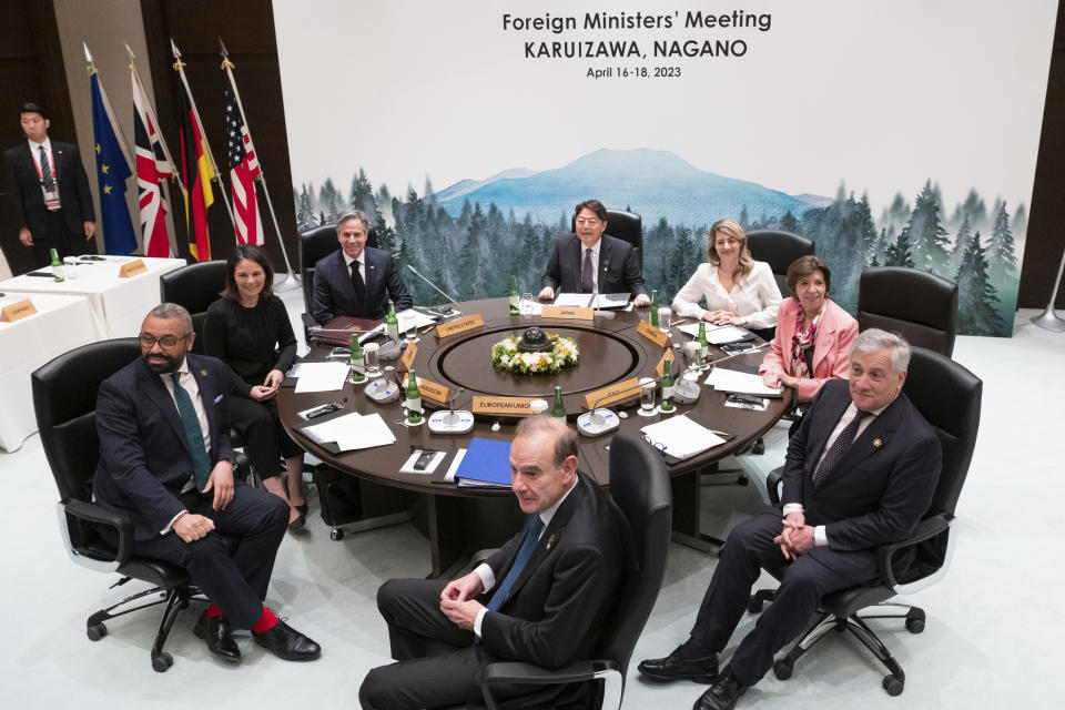 Clockwise from left, British Foreign Secretary James Cleverly, German Foreign Minister Annalena Baerbock, U.S. Secretary of State Antony Blinken, Japan's Foreign Minister Yoshimasa Hayashi, Canadian Foreign Minister Melanie Joly, French Foreign Minister Catherine Colonna, Italy's Foreign Minister Antonio Tajani and Deputy Secretary-General of the European External Action Service (EEAS) Enrique Mora pose for photographs at the start of the fifth working session of a G7 Foreign Ministers' Meeting at the Prince Karuizawa hotel in Karuizawa, Japan Tuesday, April 18, 2023. (Yuichi Yamazaki/Pool Photo via AP)