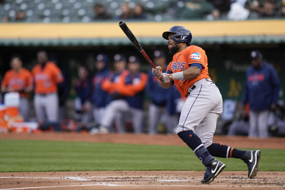 Houston Astros' Corey Julks watches his RBI-single against the Oakland Athletics during the second inning of a baseball game in Oakland, Calif., Friday, May 26, 2023. (AP Photo/Godofredo A. Vásquez)