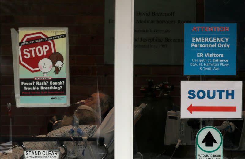 FILE PHOTO: A patient is seen inside the emergency center at Maimonides Medical Center during outbreak of coronavirus disease (COVID-19) in Brooklyn New York