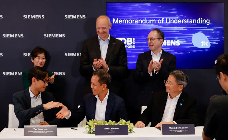 Siemens CEO Roland Busch announces their plans for a new Singapore plant, at their office in Singapore